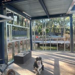 View from inside the Gilayo structure with full, glass, wing walls