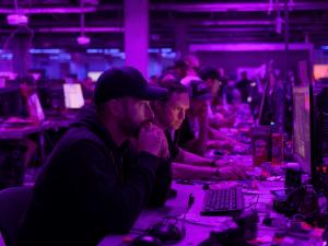 Cybersecurity analysts using QScout Pulse to monitor quantum risk and external vulnerability intelligence in a live operations environment.