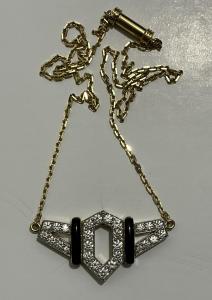 David Webb signed diamond, 18K gold and black enamel flight pendant necklace, marked “18K WEBB 900 PLAT”, the diamonds weighing 1.80 carats. Estimate: $9,000-$9,500