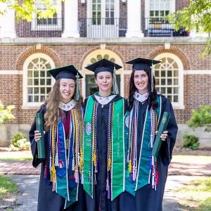 Emma Evans ’26, Ceili Allder ’26, and Maeve Delaney ’26 at Commencement.