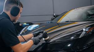 Tier 1 Autohaus PPF Installer Coating a Vehicle