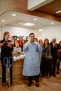 Attendees applaud Dr. Sobti following the ribbon cutting ceremony