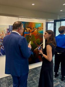 Collectors viewing African contemporary art at Art for Impact Gala, City of London 2026, remaining collection available for private sale at artforimpact.co.uk