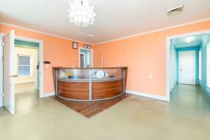 Purpose-built and previously operated as a veterinary clinic, the layout is well-suited for immediate reuse featuring space for exam rooms, treatment areas, and administrative functions. •	The current owner specialized in equestrian care