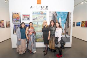 Participating Artists with MaryAnn Giella McCulloh (Photo Credit: SIPA USA for AP / Dave Warren)