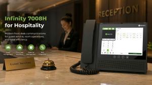 E-MetroTel Infinity 7008H Hospitality Console displayed in a hotel front desk environment with hospitality workflow features including guest management, front desk workflows, wake-up management, and PMS integration.