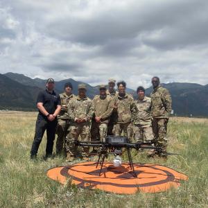 Skyfront Perimeter 8 Hybrid group photo with US Army Soldiers after successful training