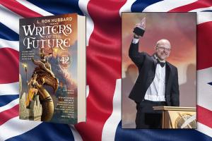L. Ron Hubbard Presents Writers of the Future Volume 42 release in the UK with Liverpool winner, Shaun Stevenson, and his award-winning story "The Triceratops Effect." Image shows Shaun holding his statue on stage, the new book next to him, and the UK fla