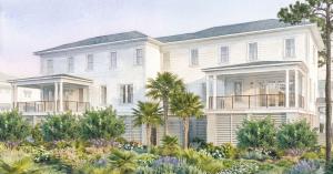 The rear of The Inlet townhomes with lush landscaping and porches