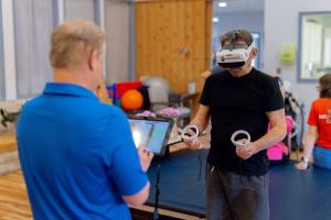 Texas NeuroRehab Center physical therapist using the AI-powered automation for notes