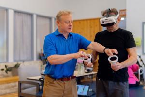Texas NeuroRehab Center physical therapist trying smart therapy for the first time