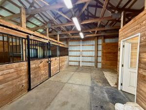4 BR/6 BA home w/horse barn, fencing, detached work shop, garage and storage buildings on 30.8 +/- Acres in Halifax County, VA