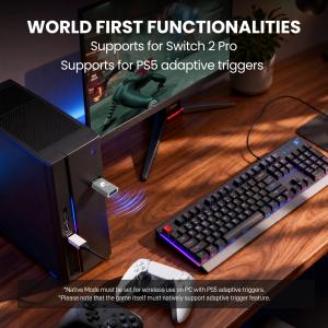 GuliKit Goku 2 Bluetooth controller adapter connected to a PC setup, highlighting Switch 2 Pro Controller support and PS5 adaptive trigger compatibility.