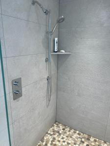 Luxury bathroom remodeling project in Miami Beach with walk-in glass shower