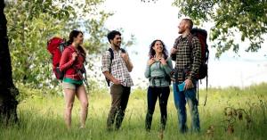 Young adults spending time outdoors together representing confidence, self-discovery, healthy routines, emotional growth, and connection beyond screens.