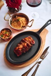 Filet of Beef Creole - Cardinal Sauce with Crawfish at The Grill Room