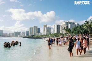 Believers are baptized along a beach in Hawaii as part of Baptize the World, a global Pentecost Sunday baptism movement that united churches, pastors and communities across 49 countries.