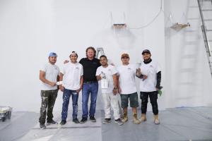 Photo of Chad Young, owner of Mister Painter Group, and some of their team
