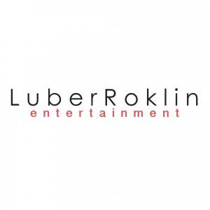 The Luber Roklin Entertainment logo displayed on a light gray background. The words “Luber Roklin” appear in black lowercase lettering, with the word “entertainment” written underneath in smaller red lowercase text.