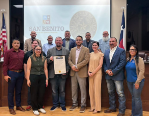 City of San Benito Mayor Pedro "Pete" Galvan and city commissioners join Sunny Glen Children's Home staff as the city officially proclaims May as National Foster Care Awareness Month.