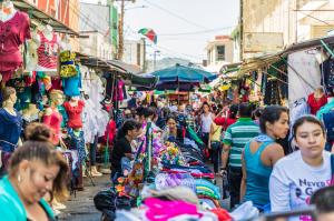 Shoppers browse stalls at central market in El Salvador