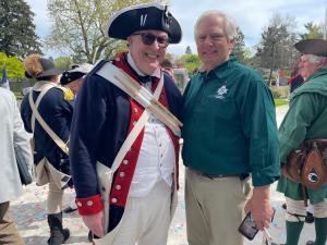 (From Left) Revolutionary War-era character, American Heritage Partners President Jay Dickey