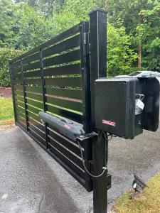 automated modern iron gate installation in Orange County