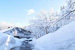 Tsunan Sake Brewery building in heavy snow, Niigata, Japan