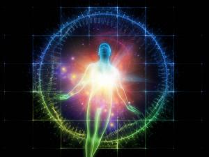 schematic photo of a human being in multiple colors with colors of energy around the entire body