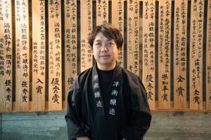 Portrait of Kengo Suzuki, President and CEO of TSUNAN SAKE BREWERY, who commented on the Tokyo Sake Challenge 2026 Gold award.