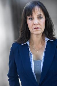 Actress Pilar Uribe looks directly into camera