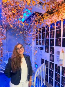 Olivia Barrionuevo in front of her Monarch Project installation