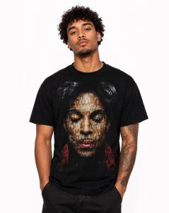 Male model wearing the wearable art which features a mosiac portrait of Prince