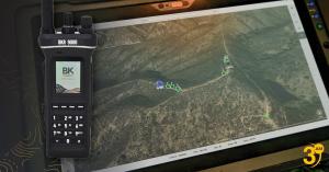BKR 9000 handheld radio by BK Technologies alongside a FLORIAN operational map showing real-time personnel tracking across wildland terrain