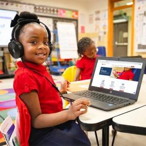 A student explores the new Impact Charter School West website, which was redesigned to provide families with easier access to school information, resources, and enrollment materials