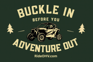 An illustration that reads Buckle In Before You Adventure Out. It shows an ROV with the driver wearing a seat belt.