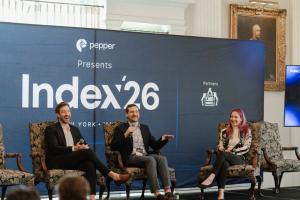 Jonathan Metrick (Sagard), Neal Behrend (Insight Partners), and Tara Marsh (Bain & Company), speaking on a panel on AI Search Trends from a Macro Perspective at INDEX'26 NY