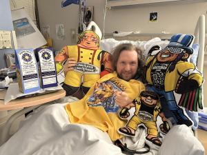 Roger Foley with samples in Hospital