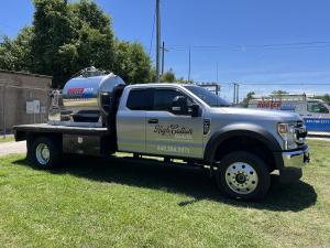 Rooter-Man Plumbing and High Cotton Comfort Co.'s new Ford F-450 pump truck equipped with a 300-gallon waste tank and 100-gallon fresh water capacity for restroom trailer servicing in Charleston, South Carolina.