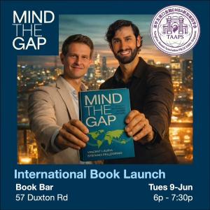 Vinnie Lauria and Stefano Pellegrino holding a copy of Mind the Gap: Scaling Businesses Across Cultures during the book's international launch in Singapore. The Wiley-published book explores how culture influences international business expansion, leaders
