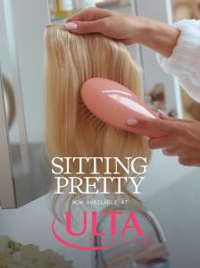Sitting Pretty Halo Hair now at Ulta Beauty — hands brushing a blonde halo extension with a pink brush