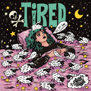Album cover art of a woman with colorful hair trying to fall asleep and counting sheep, the sheep say "Let It Go" which are lyrics to the song