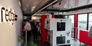 Pulse Trailer roadshow trailer interior showing live HVAC product demonstrations and industry visitors | The Clear Idea