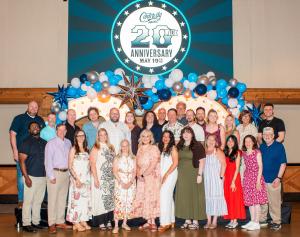 Centricity Music staff are pictured during the record label’s 20-year celebration. More than 400 people, including artists, associates and their families, attended the event held May 19.