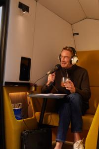 Man podcasting in a Kabin Performance Sanctuary