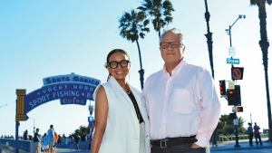 Machina Managing Directors Bernadette Abasta and Michael Pierce pictures in front of the Santa Monica Pier on Ocean Avenue in Santa Monica, California