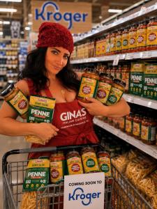 Gina Sicilia with her sauce line for Gina’s Skinny Italian, a food brand featuring low carb and no sugar added products
