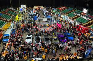 Wide aerial view of GSF Car Parts TechFest North 2026 at Utilita Arena Newcastle, showing thousands of attendees, exhibitor stands, vehicle displays and live activities.
