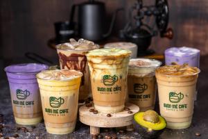 A signature coffee spread at Buon Me Cafe featuring Vietnamese coffee specialties, including rich egg coffee, in the heart of Little Saigon San Jose.