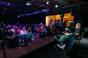 Oak Felder and Khris Riddick-Tynes speaking about songwriting and production in front of live audience
